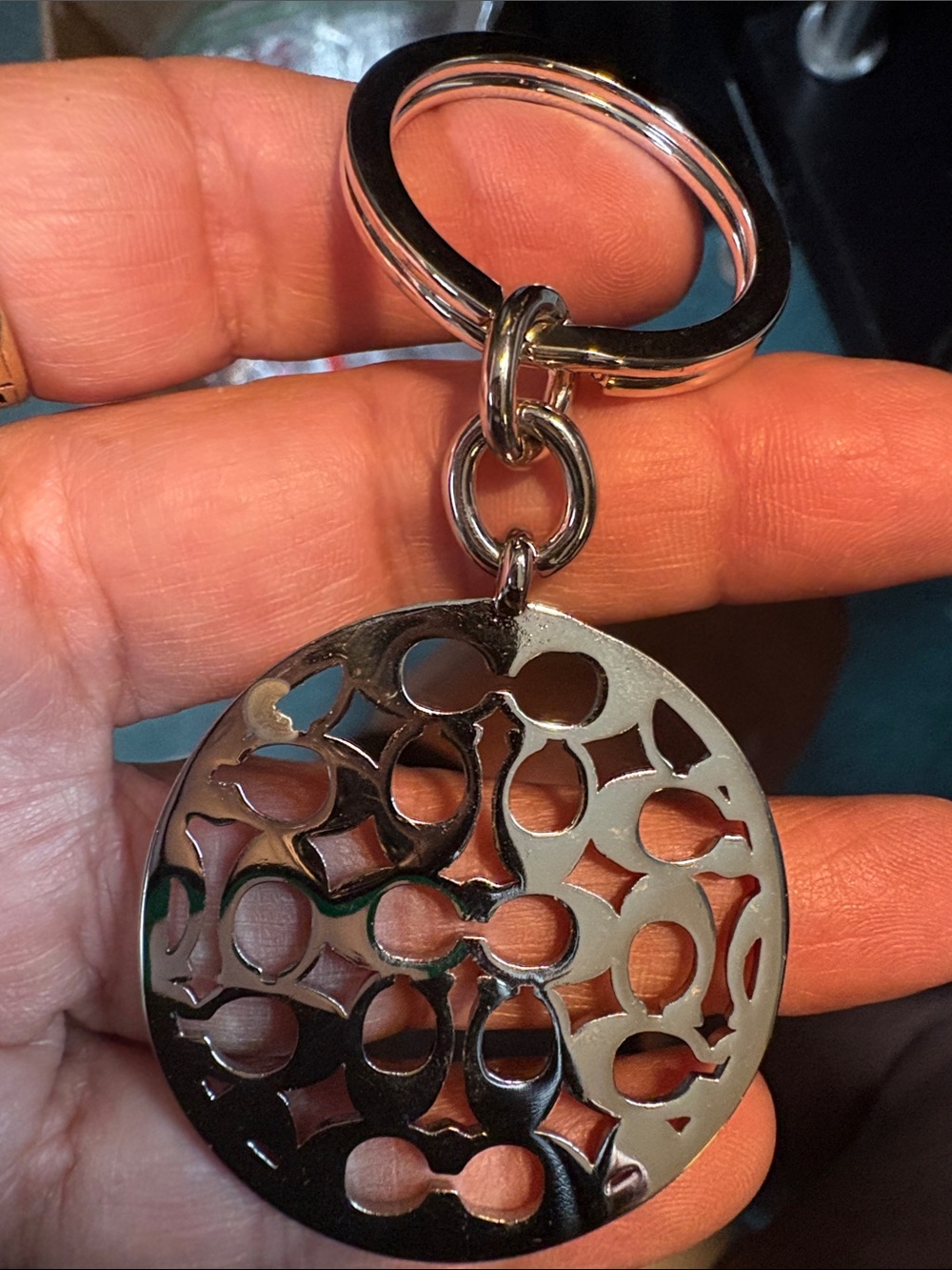 Coach Silver-Tone Circular Signature Cutout Keyring - Picture 3 of 4